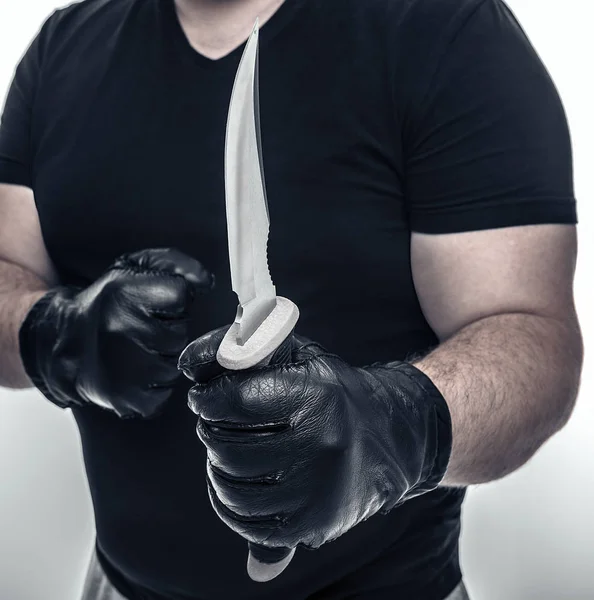 Man med kniv i en hand. — Stockfoto