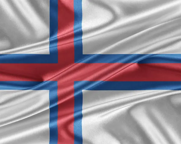 Vlajka Faerských ostrovů s lesklé hedvábné textury. — Stock fotografie