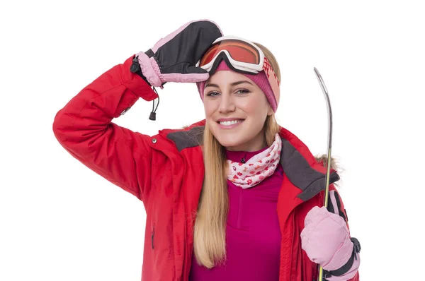 Aantrekkelijk meisje skiër op witte achtergrond. — Stockfoto