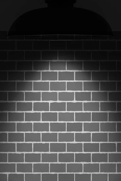 Faretto illuminato muro di mattoni di pietra . — Foto Stock
