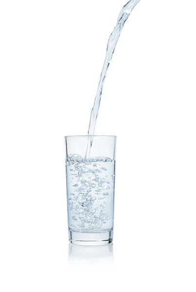 Wasser spritzt aus Glas. — Stockfoto