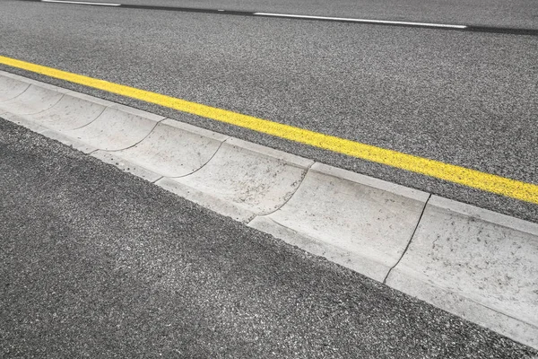 Drain channel on the asphalt road. — Stock Photo, Image