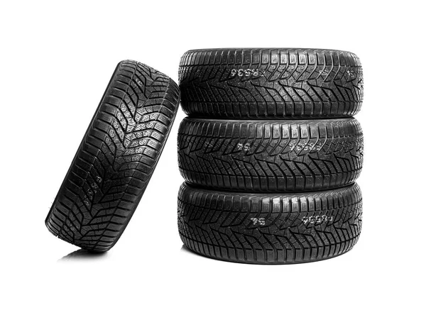 Zimní pneumatiky na bílém pozadí. — Stock fotografie