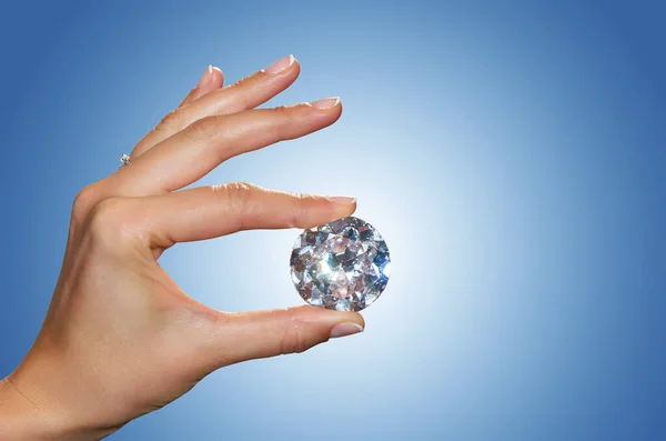 Diamond in a womans hand — Stock Photo, Image