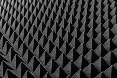 Piramitler ve ejderha pulları şeklinde soyut bir arkaplan.