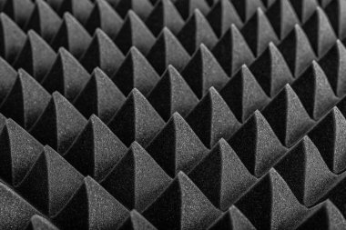 Piramitler ve ejderha pulları şeklinde soyut bir arkaplan.