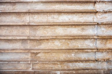 Soyut bir arkaplan olarak taş beton duvar.