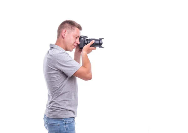 Il fotografo con la macchina fotografica su bianco . — Foto Stock