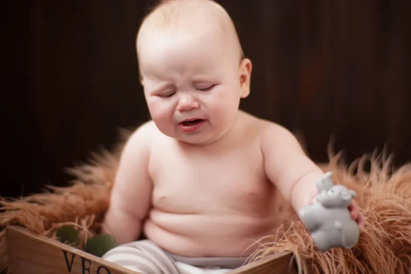 A unhappy baby — Stock Photo, Image