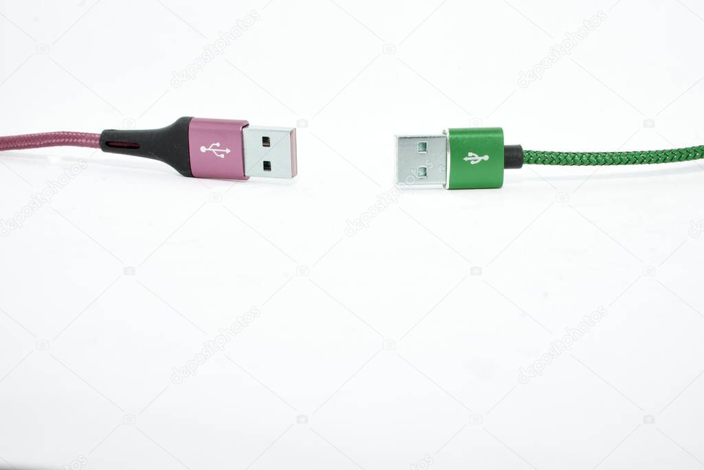  Keep distance.Two USB cable on the white background.                       