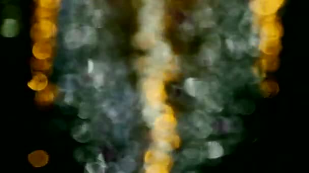 Lichter Bokeh Kreise Reflektieren Wasserwelle Der Nacht Szene — Stockvideo