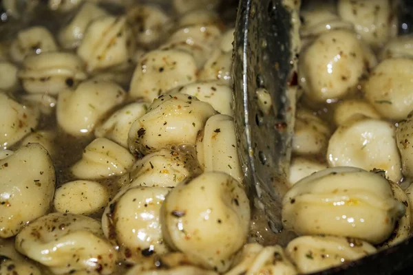 Dumplings cooked in a pan with spices. Close up. — Stock Photo, Image