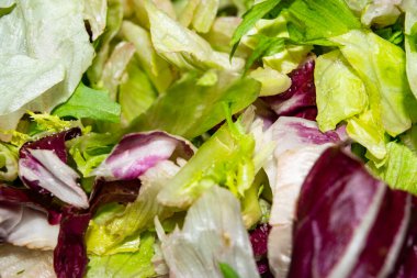 Yaprak marul yüzey dokusunu kes. Kapatın. Arkaplan resmi