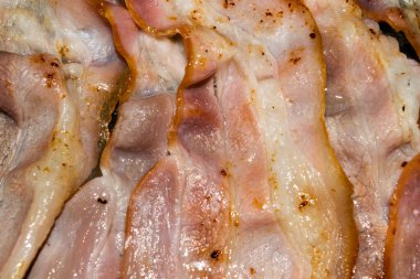 Kızarmış domuz pastırması. Kapat.