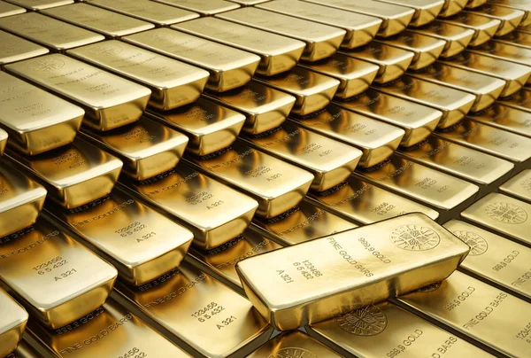 Ingots gold bars stacked aligned with one placed randomly. — Stock Photo, Image