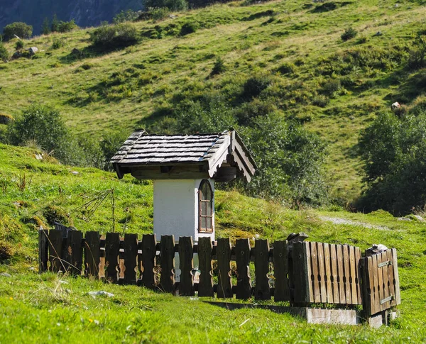 Christian wayside shrine in mountain area — Stock Photo, Image