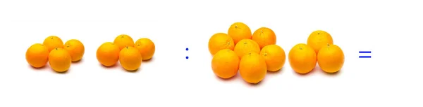 Division, simple mathematical operation; division between oranges — 스톡 사진