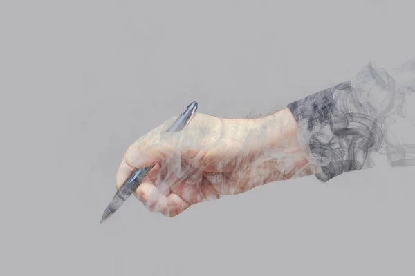 Pen in the hand of an adult — Stock Photo, Image