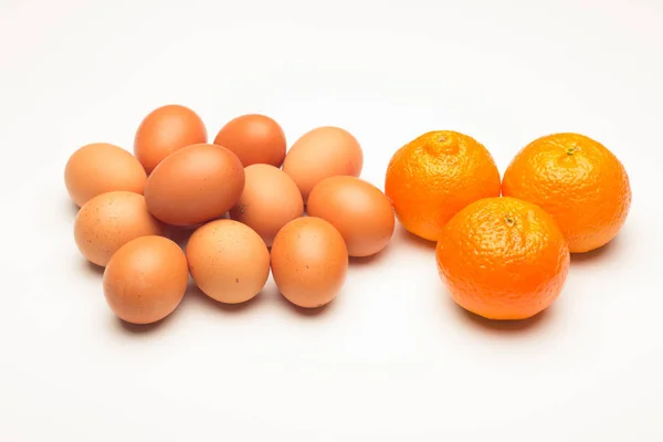 Uova e mandarino, colesterolo e vitamine — Foto Stock