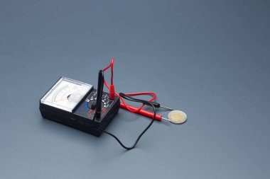 Tester measuring and control apparatus to find out both alternating and continuous electric current flows; widely used by electronics professionals such as electricity.