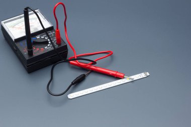 Tester measuring and control apparatus to find out both alternating and continuous electric current flows; widely used by electronics professionals such as electricity.