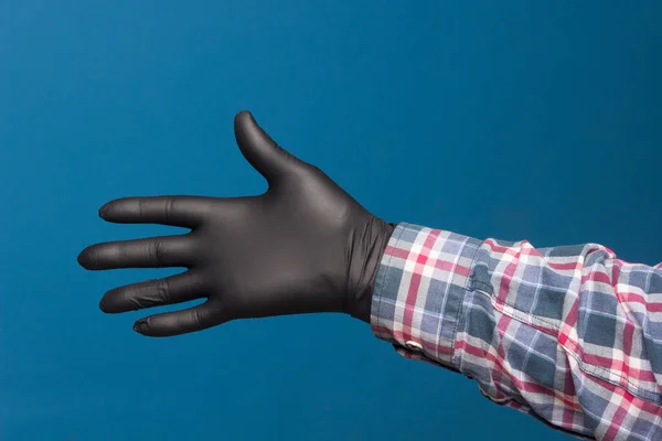 Hygienic hand protection, fine black glove to avoid losing touch in the hands. Hand and finger signs.