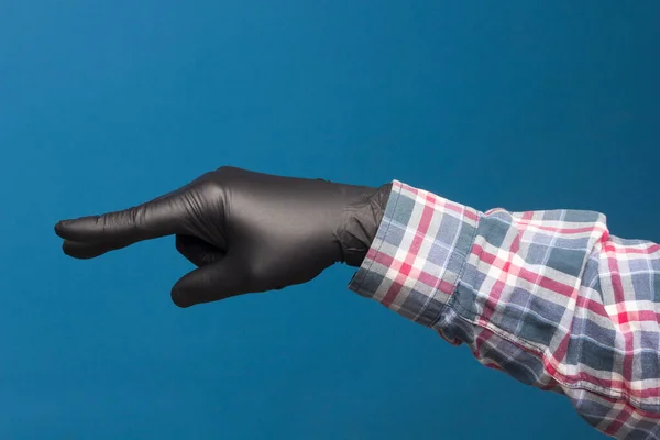 Hygienic hand protection, fine black glove to avoid losing touch in the hands. Hand and finger signs.