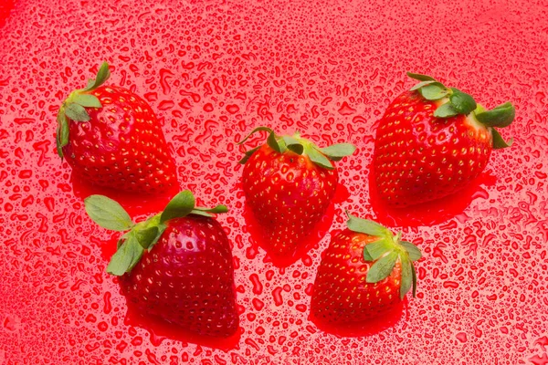Red strawberries, rich in vitamins, eaten raw, in jam, in ice cream, few calories, sweet taste.
