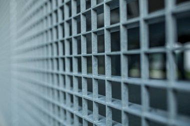 Küçük hücre kılavuz hisse senedi arka plan shallo ile metal kafes