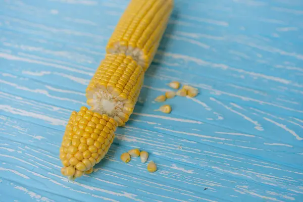 Corn Cob Green Leaves Lies Table Blue Color Background Copy — Stock Photo, Image