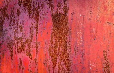 Soyut kırmızı ve kahverengi arka plan, boyanmış ve aşınmış metal kapılar.