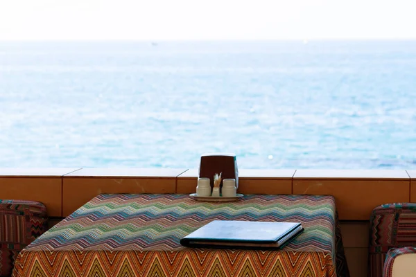 Restaurant with view from open window on the sea. — Stock Photo, Image