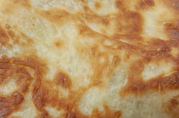 Macro-shooting of the baked dough. — Stock Photo, Image