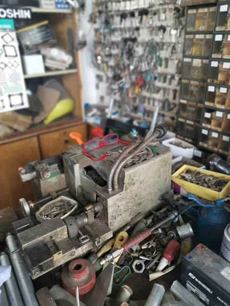 Perak,Malaysia. March 13,2020: Scene of all the equipments and tools use to duplicate assortments of spare keys at Ah Lau Hardware Shop Kampong Koh.