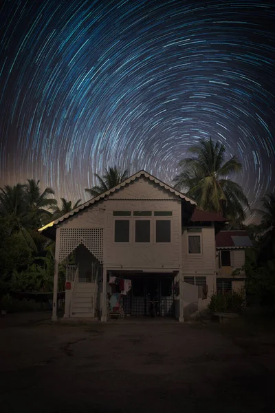night stars trail at the old malay village home