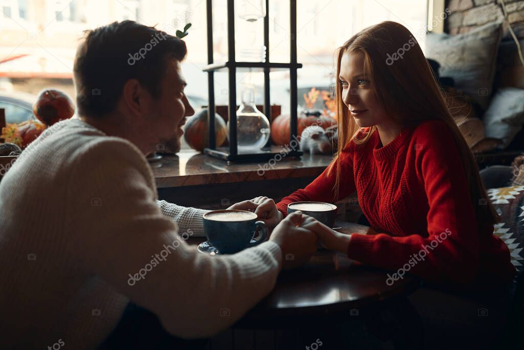 young man sharing with ideas with his girlfriend