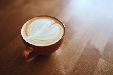 high-quality cup of latte with heart shape