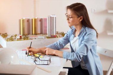 clever successful architect creating graphics, objects, project