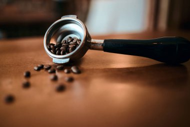 barista left a portafilter with beans