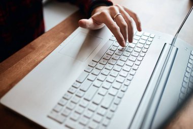typist working in the office.man wiping files by mistake