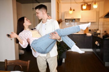 overjoyed family with keys to their new apartments