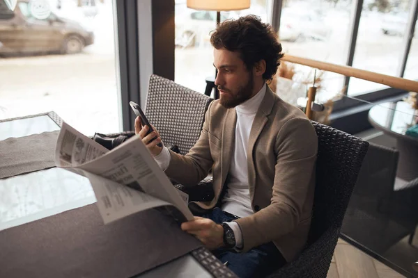 guy in fashion casual clothes trying to connect to the internet