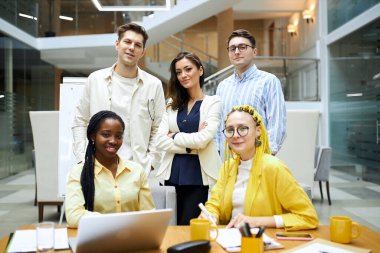 young successful ambitious employees posing to the camera