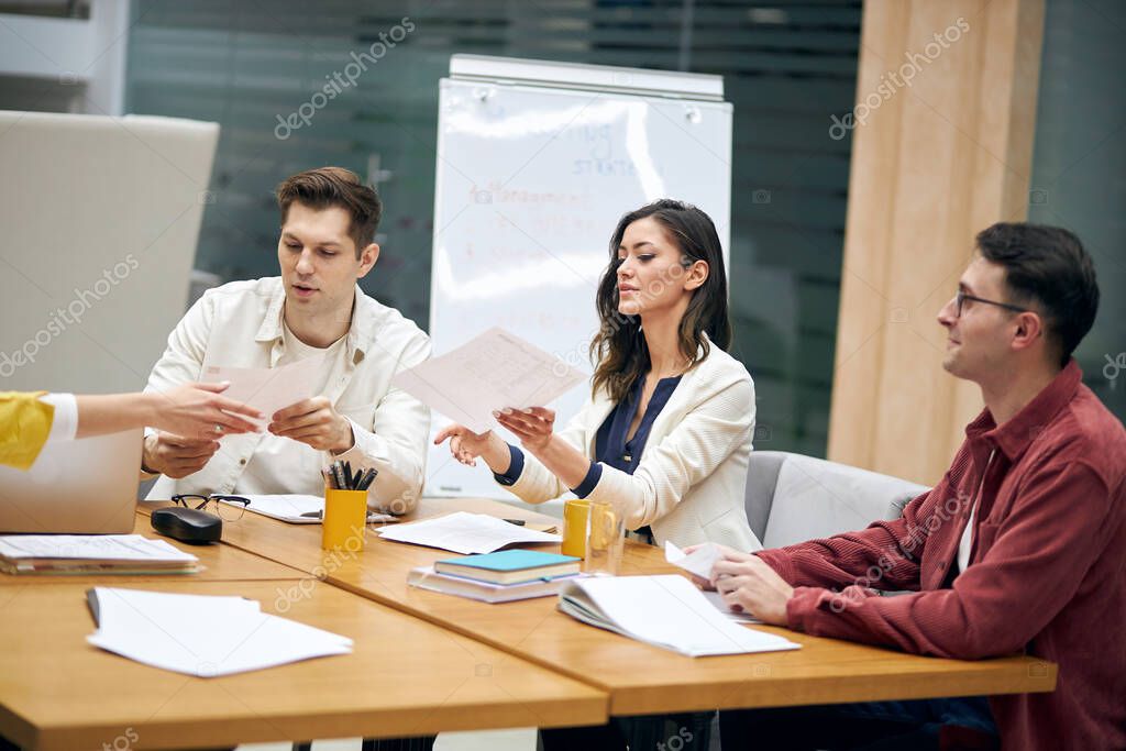 business people working with paperwork, brainstorming