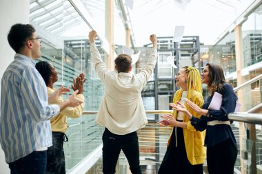 young businessman is happy as his company has unbelievable results