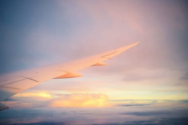 View from airplane window with sunset time — Stock Photo, Image