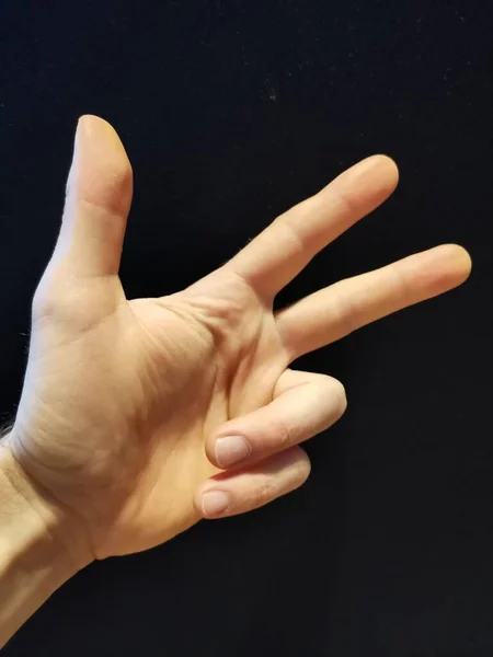 Mão esquerda um homem, o terceiro, três, número de contagem — Fotografia de Stock