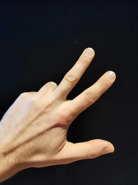 Mão esquerda um homem, o terceiro, três, número de contagem — Fotografia de Stock