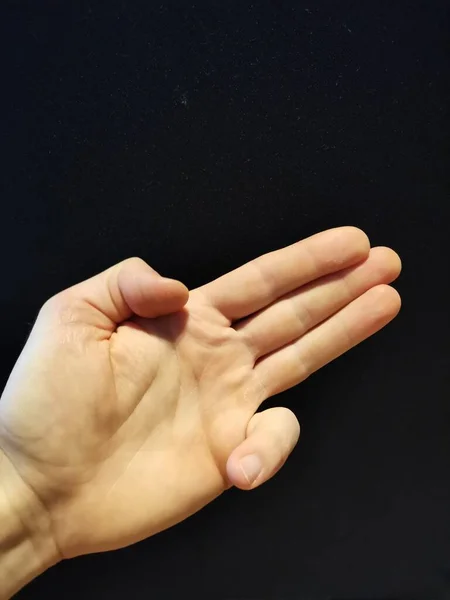 Ліва рука чоловік, третя, три, нумерація — стокове фото