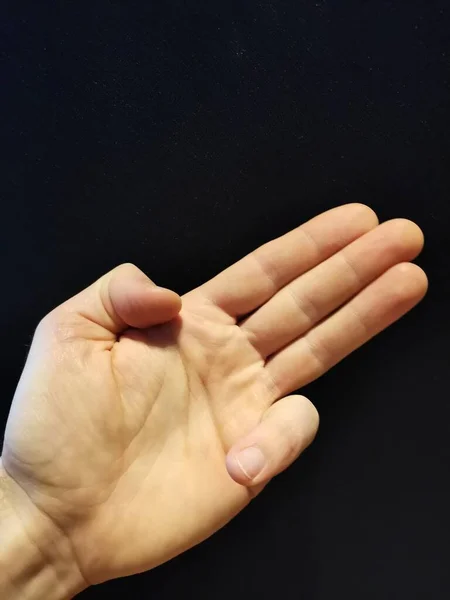 Ліва рука чоловік, третя, три, нумерація — стокове фото